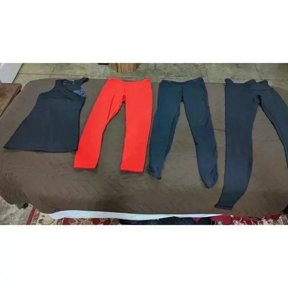 LOT of Lululemon workout leggings and top in black and one red, size 4